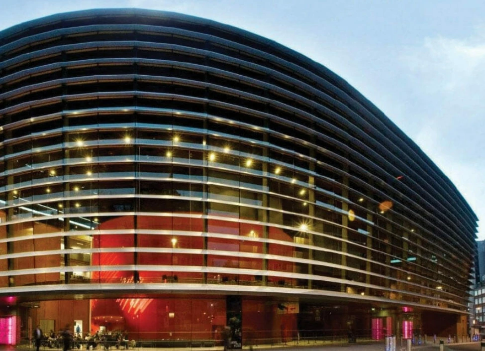 people walking by leicester curve theatre