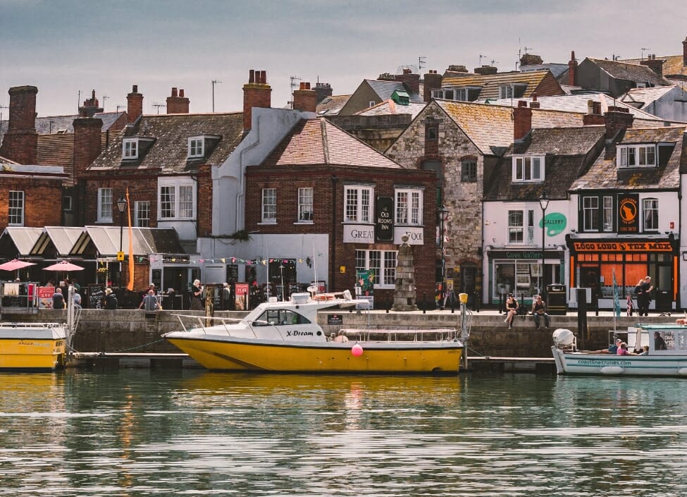 weymouth harbour by the sea with boats and buildings