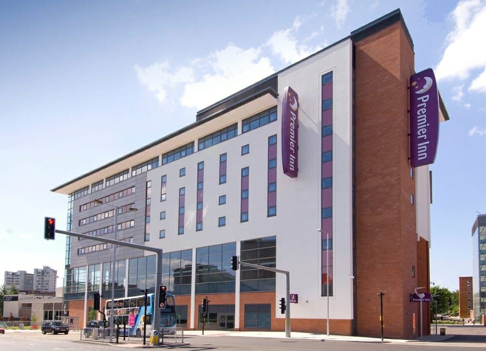 Premier Inn Coventry City Centre Hotel with numerous windows and several storeys, by a road
