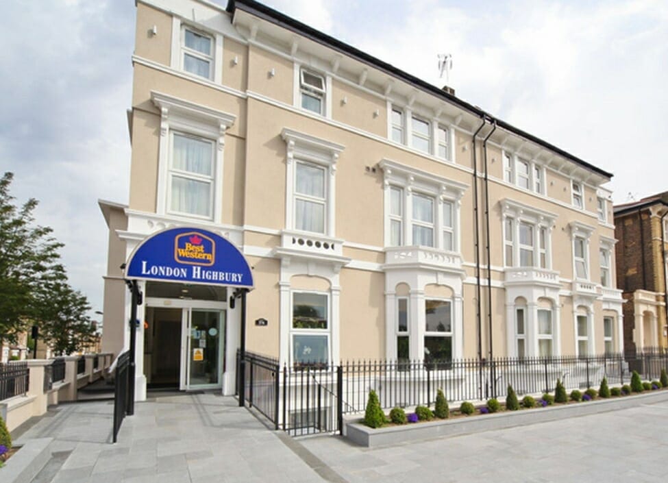 Best Western London Highbury Hotel a cream and white building with large windows and a great pavement with trees outside