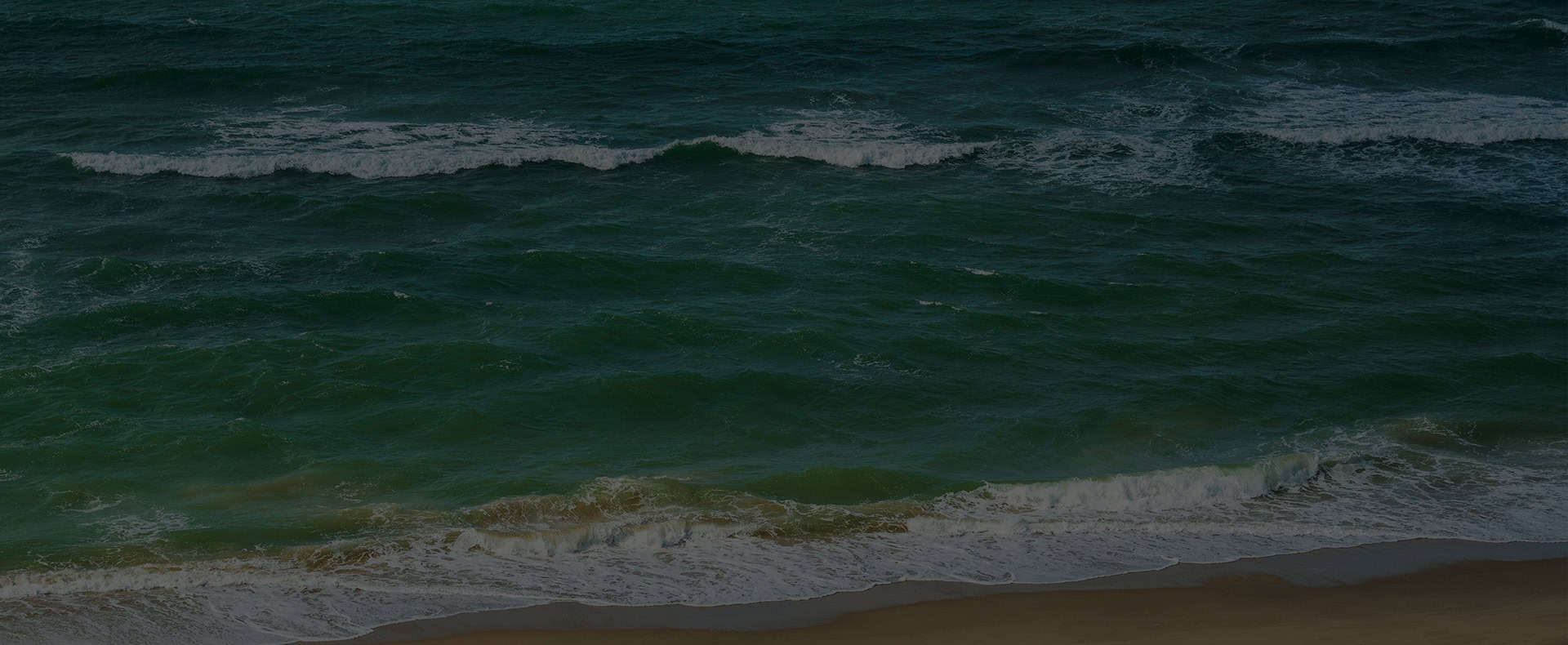 Waves approacgin the beach in Bournemouth.